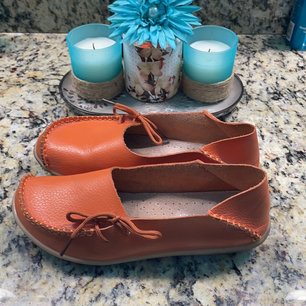 Beautiful orange  color,  soft leather flats